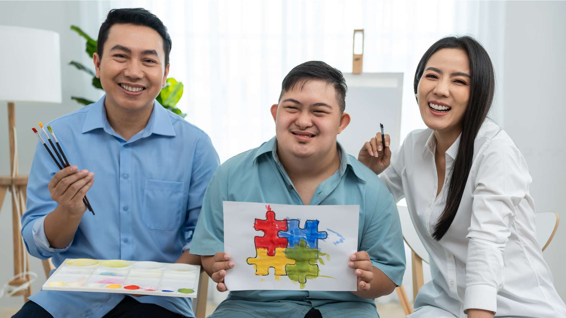 Silver State Adolescent Treatment Family Painting Autism Puzzle Logo With Son