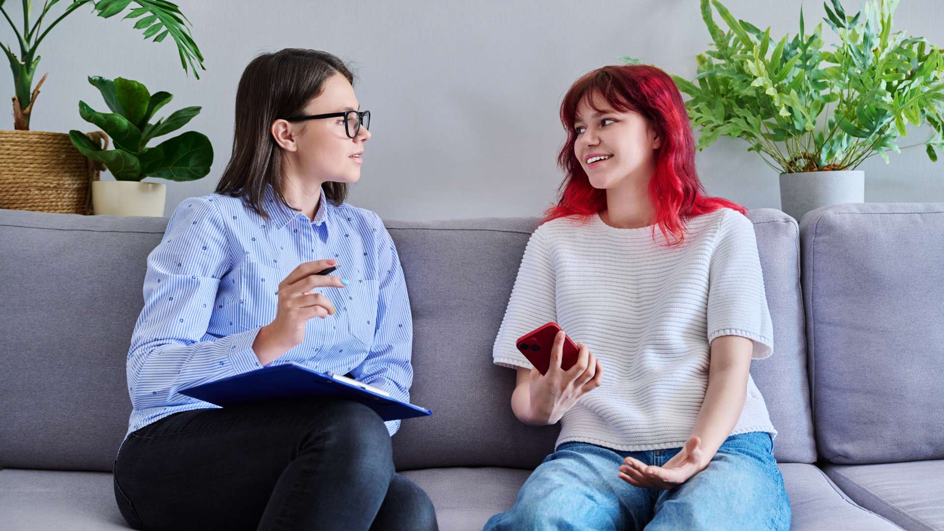 Silver State Adolescent Treatment Teen Woman With Red Hair in Psychotherapy With Psychologist
